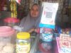 Ancaman Tergerus Mobile Banking, Semangat Azizah Menjaga Denyut Nadi Ekonomi Keluarga
